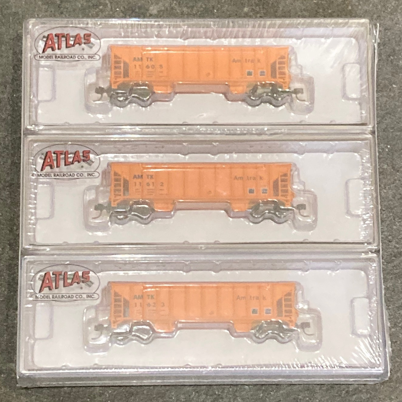 N Scale - Atlas - 50 005 474 - Open Hopper, Ballast, 100 Ton - Amtrak - 3-Pack