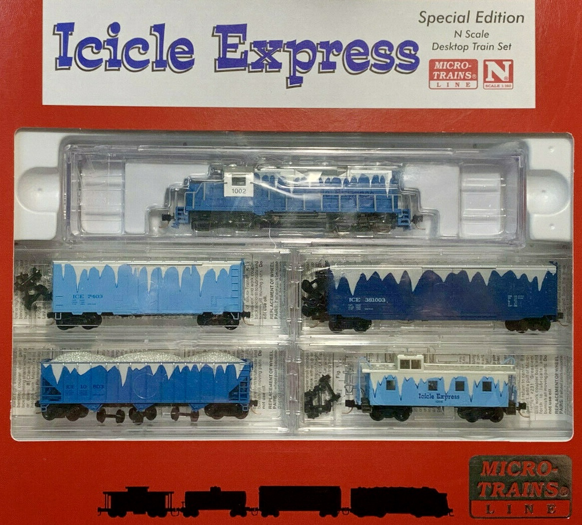 N Scale - Micro-Trains - 993 21 711 - Passenger Train, Diesel, North American, Transition Era - Holiday Car - Icicle Express